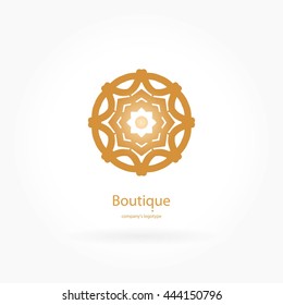 Luxury logotype in the shape of a flower for antique boutique. Gold logo, flower. Simple geometric sign. Icons, business, invitations. Volumetric golden big bud. Vintage. Islam, Arabic, Indian. 