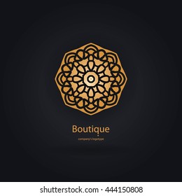 Luxury logotype in the shape of a flower for antique boutique. Gold logo, flower. Simple geometric sign. Icons, business, invitations. Volumetric golden big bud. Vintage. Islam, Arabic, Indian. 