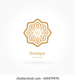 Luxury logotype in the shape of a flower for antique boutique. Gold logo, flower. Simple geometric sign. Icons, business, invitations. Volumetric golden big bud. Vintage. Islam, Arabic, Indian. 