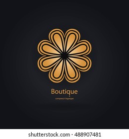 Luxury logotype in the shape of a flower for antique boutique. Gold logo, flower. Sign, icons, business, invitations. Volumetric golden big bud. Vintage. Simple geometric mandala. Kaleidoscope blossom