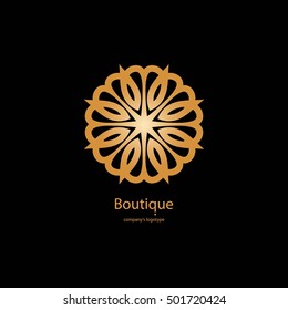 Luxury logotype in the shape of a flower for antique boutique. Gold logo, flower on black background. Simple geometric sign. Icons, business, invitations. Volumetric golden big bud. Vintage. Retro.