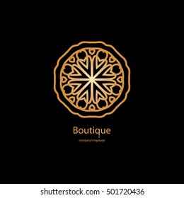 Luxury logotype in the shape of a flower for antique boutique. Gold logo, flower on black background. Simple geometric sign. Icons, business, invitations. Volumetric golden big bud. Vintage. Retro.