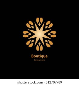 Luxury logotype in the shape of a flower for antique boutique. Gold logo, flower on black background. Simple geometric sign. Icons, business, invitations. Volumetric golden big bud. Vintage. Retro.