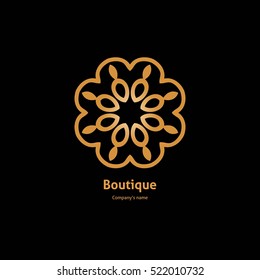 Luxury logotype in the shape of a flower for antique boutique. Gold logo, flower. Simple geometric sign. Icons, business, invitations. Volumetric golden big bud. Vintage. Islam, Arabic, Indian. Retro.