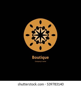 Luxury logotype in the shape of a flower for antique boutique. Gold logo, flower. Simple geometric sign. Icons, business, invitations. Volumetric golden big bud. Vintage. Islam, Arabic, Indian. Retro.