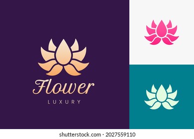 Luxury lotus flower logo in gold color for beauty spa or salon