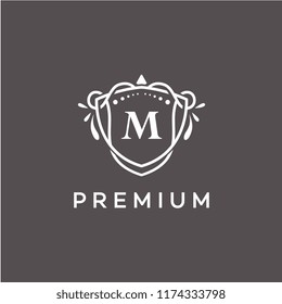 Luxury M Initial Logo frame symbol, Luxury and graceful floral monogram design dark background