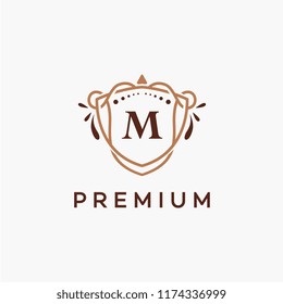 Luxury M Initial Logo frame symbol, Luxury and graceful floral monogram design dark background