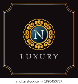 Luxury Mandala Badge N Letter Logo Design. Elegant Ornate Decoration Luxurius Logo Template.