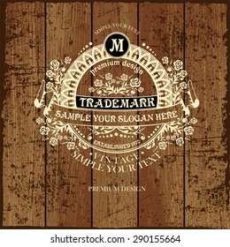 Luxury Monogram Emblem template. Elegant Frame Ornament line Logo design vector illustration. Good for  Restaurant, Boutique, Cafe, Hotel, Heraldic, Jewelry, Fashion.  Template Wood Texture 