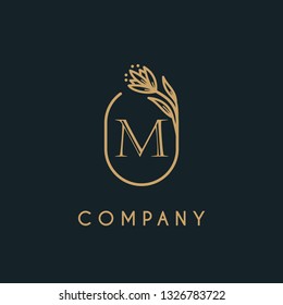 luxury monogram letter M logotype with flower icon concept. premium elegant alphabet/initial frame design vector. can be used for beauty industry, cosmetics, salon, boutique, company, corporate