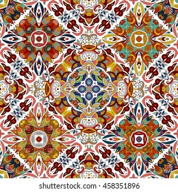 Luxury oriental tile seamless pattern. Colorful floral patchwork background. Doodle flowers boho chic style. Rich flower ornament. Square design elements. Portuguese motif. Unusual flourish print.