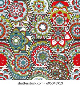 Luxury oriental tile seamless pattern. Colorful floral patchwork background. Mandala boho chic style. Rich flower ornament. Hexagon design elements. Portuguese moroccan motif. Unusual flourish print.
