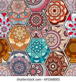 Luxury oriental tile seamless pattern. Colorful floral patchwork background. Mandala boho chic style. Rich flower ornament. Hexagon design elements. Portuguese moroccan motif. Unusual flourish print.