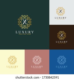 logotipo de vectores premium de lujo con adorno dorado