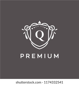 Luxury Q Initial Logo frame symbol, Luxury and graceful floral monogram design dark background