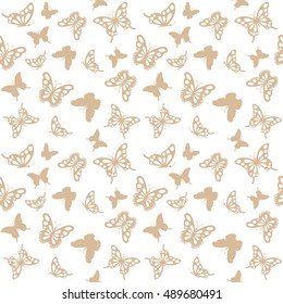 Luxury seamless pattern background with golden filigree butterflies isolated on white. For wedding invitation, birthday card, wrapping paper.
