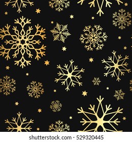 Luxury seamless pattern with gold snowflakes on a black background