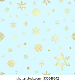 luxury seamless pattern with gold snowflakes on a blue background. Christmas snowflakes and star seamless background