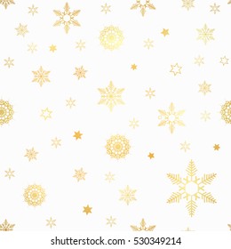 luxury seamless pattern with gold snowflakes on a white background. gold star seamles