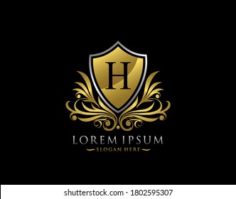 Luxury Shield H Letter Logo. Graceful Elegant Gold Shield Icon Design.  