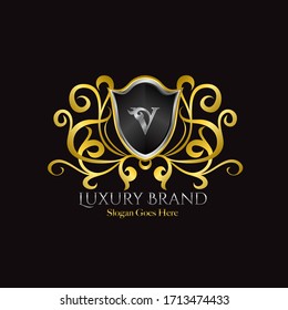 Luxury Shield Logo Letter V Golden Color Vector Design Concept Luxurious Royal Brand Identity.