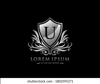 Luxury Shield U Letter Logo. Graceful Elegant Silver shield icon design.  