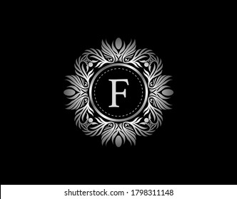 Luxury Silver Badge F Letter Logo. Luxury calligraphic vintage emblem with beautiful classy floral ornament. Vintage Heraldic Frame design Vector illustration.