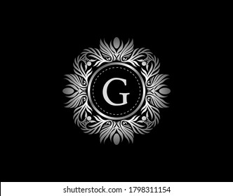 Luxury Silver Badge G Letter Logo. Luxury calligraphic vintage emblem with beautiful classy floral ornament. Vintage Heraldic Frame design Vector illustration.