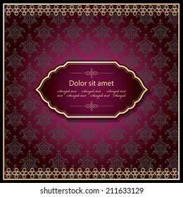 Luxury template. Elegant filigree frame in gold on damask background.