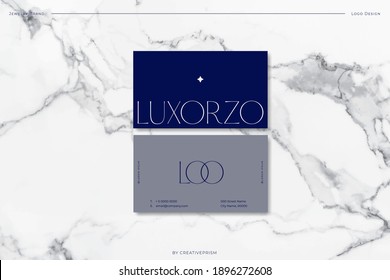 Luxury vector logo with business card template. Premium monogram logo with blue design. Elegant corporate jewelry identity.