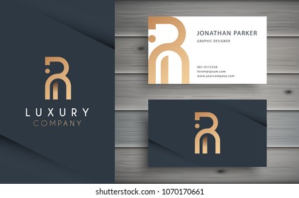 Luxury vector logotype with business card template. Premium letter R logo with golden design. Elegant corporate identity.