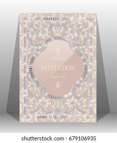 Luxury wedding invitation card with haute couture and gem diamond jewelry have glitter on lace floral pattern background.
