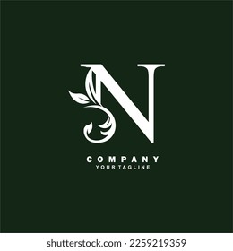 luxury white initial N letter logo design with beautiful ornament. suitable for business logo, company, beauty, fashion, brand, boutique, hotel, etc. monogram logo