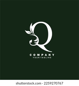 luxury white initial Q letter logo design with beautiful ornament. suitable for business logo, company, beauty, fashion, brand, boutique, hotel, etc. monogram logo