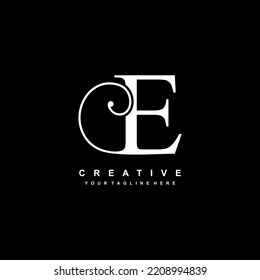 luxury white letter E logo design. E flourish. E monogram logo, typography logo. beautiful letter E. suitable for business logo, company, beauty, boutique, wedding, etc