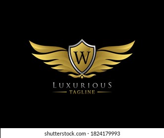 Luxury Wings Logo With W Letter. Elegant Gold Shield badge design for Royalty, Letter Stamp, Boutique,  Hotel, Heraldic, Jewelry, Automotive.