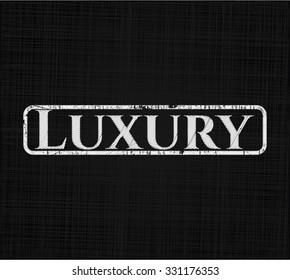 Luxury written with chalkboard texture