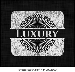 Luxury written with chalkboard texture