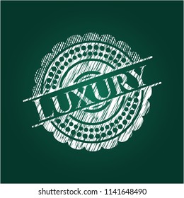 Luxury written on a blackboard