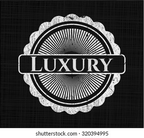 Luxury written on a blackboard