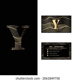 Luxury Y vector logotype with business card template. 
Premium letter Y logo with golden wave line style. 
Elegant corporate identity.
