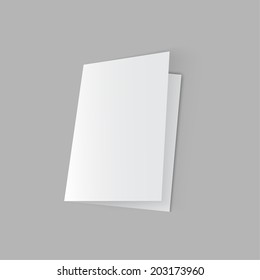 lying half-open blank  fold paper brochure on gray background. 