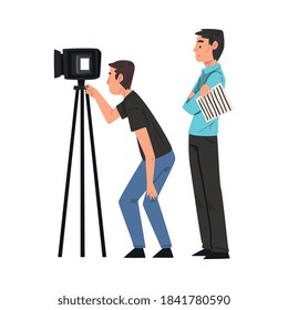 M Cameraman Shooting with Video Camera on Tripod, Anchorman Standing Next to Him, Television Industry Concept Cartoon Style Vector Illustration