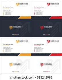 m and e letters business cards, dark blue, yellow and red colors