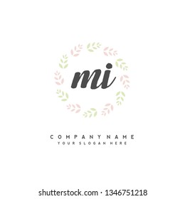 M I Initial handwriting logo vector
