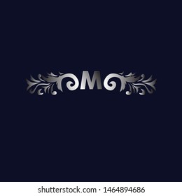 M initial logo letter with beauty ornament for fashion industry