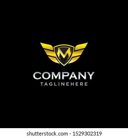 M initial shield with wings gold color icon logo vector eps 10