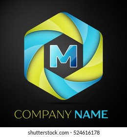 M Letter colorful logo in the hexagonal on black background. Vector template for your design
