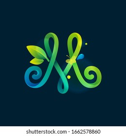 M letter eco logo with green curved lines, leaves and dew drops. Vector handwritten script font for nature labels, bio company, spring posters etc.